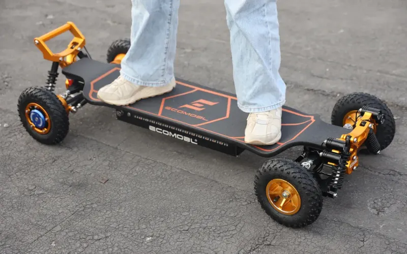 a person standing on an electric skateboard