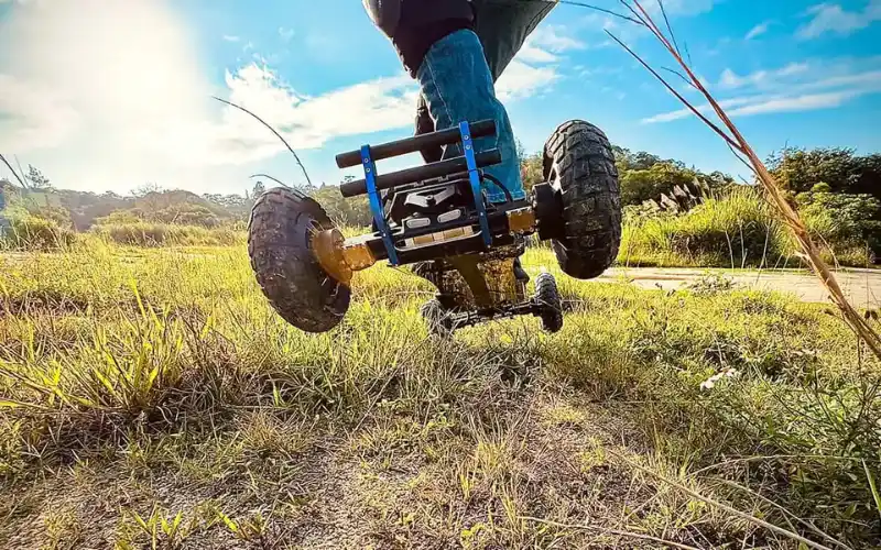 rider doing tricks on telum ba electric mountainboard