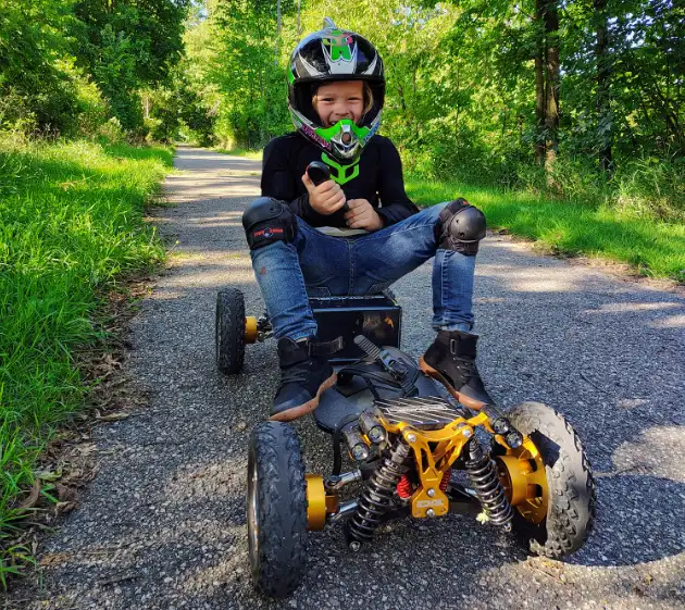 kid on an electric skateboard