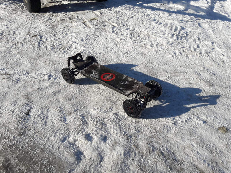 Electric skate boards in the snow