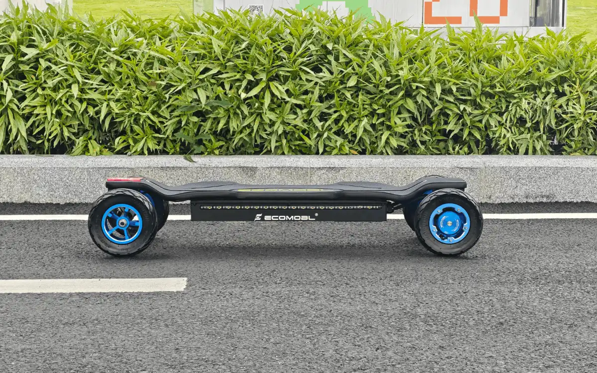 new et2 pro 2wd e-skateboard side view on road
